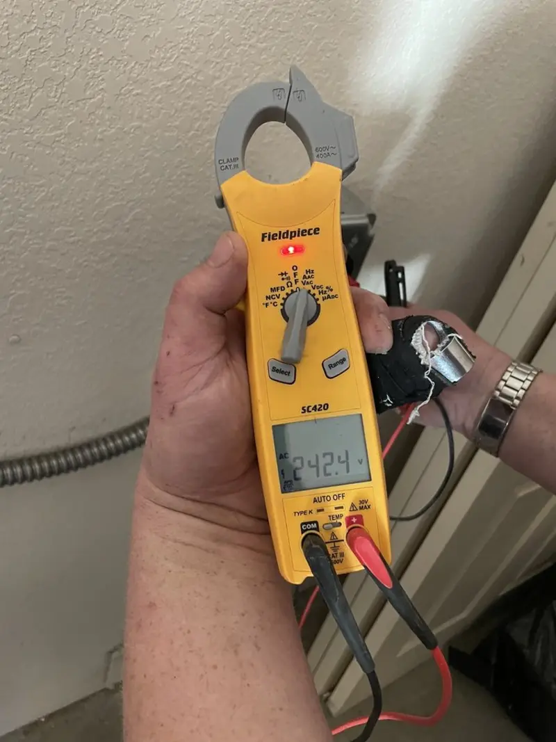 Voltage testing with clamp meter during Circuit Breaker Repair in Merrimac
